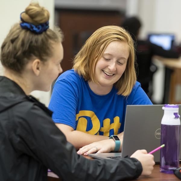 two students study together