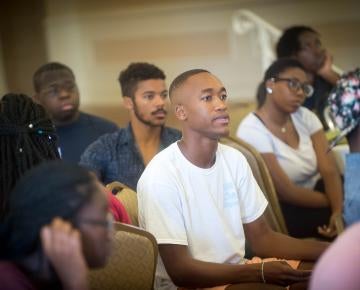 Students participate in a classroom discussion