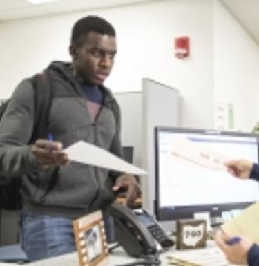 person holding a paper