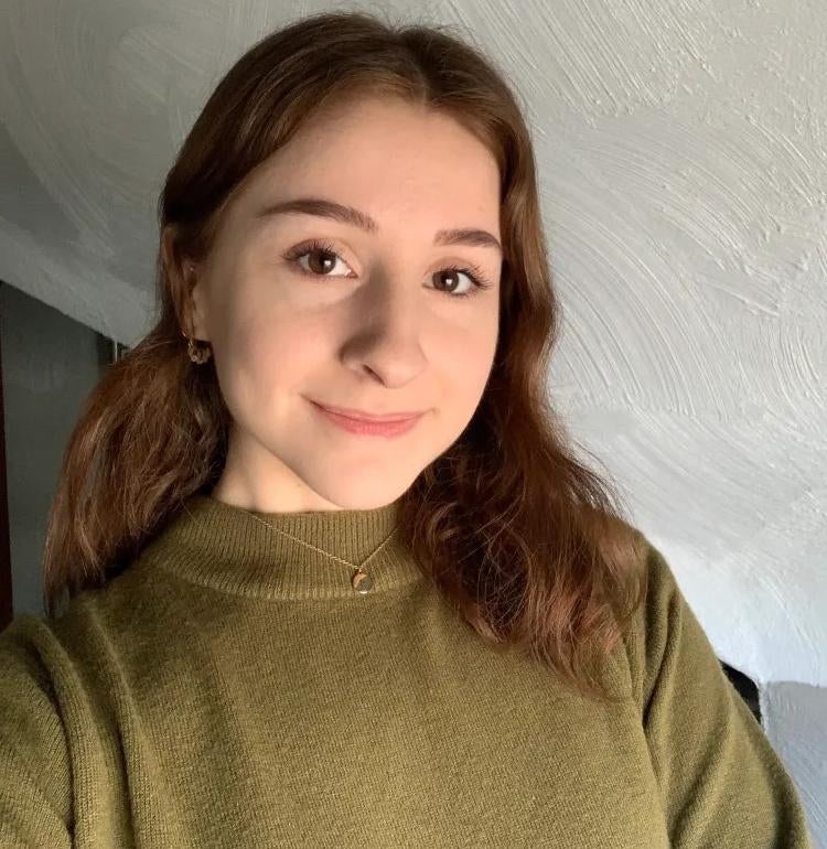 Natalie Frank, Portrait of a young woman in a green sweater